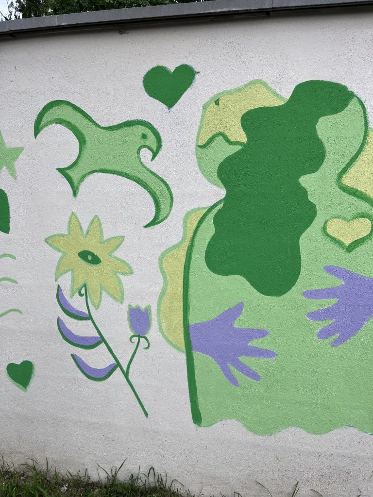 mural-galerie-fresque-pour-la-paix-pédagogique-grigny-gros-plan-femmes-calin